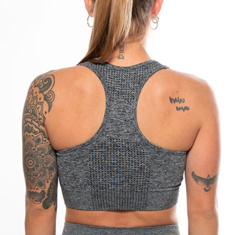 Top deportivo XHEN gris espalda deportes hibridos